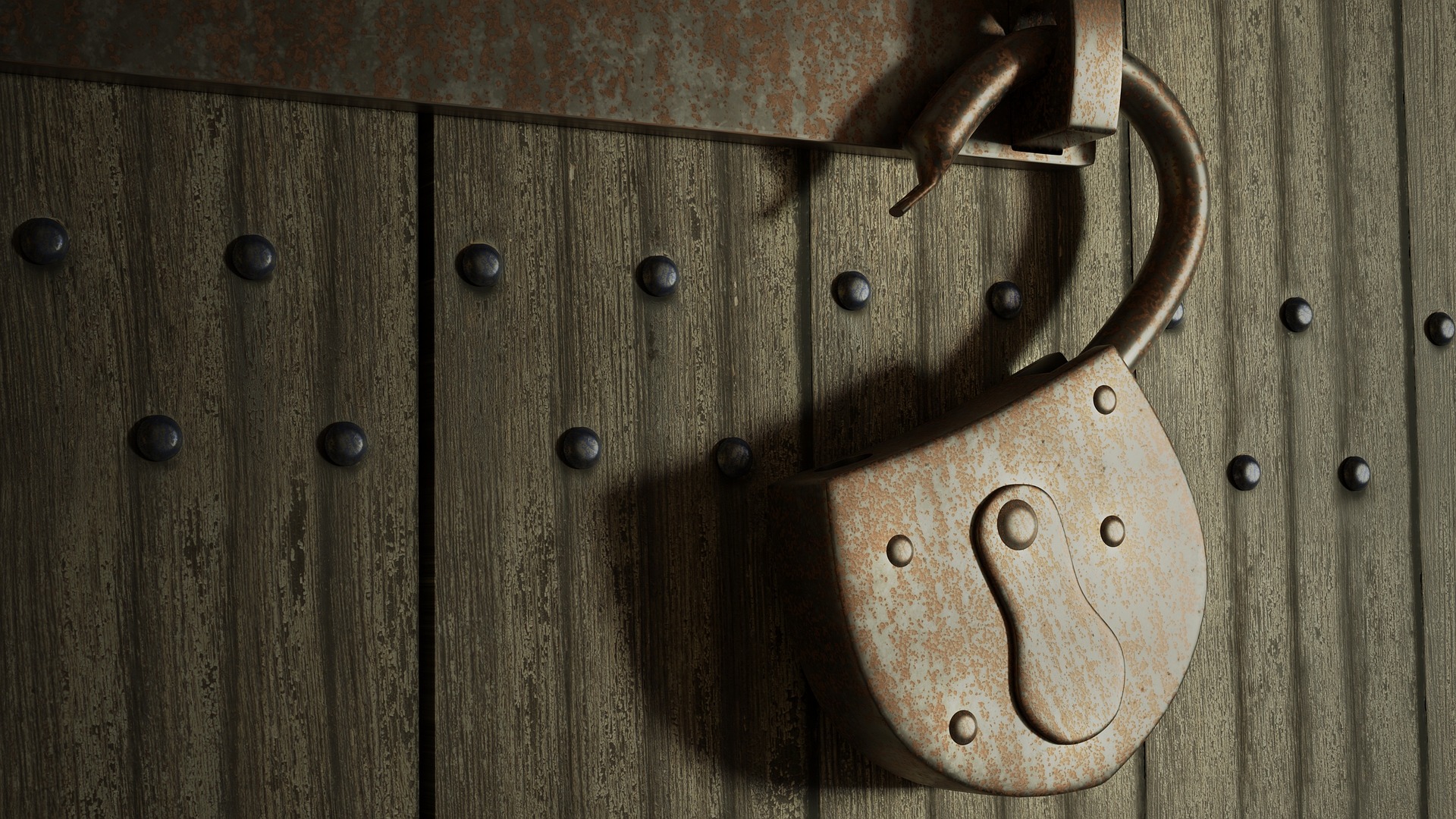An open padlock on a weathered wooden gate symbolizing freedom and breaking free